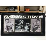 A framed and glazed signed photograph of Jake La M