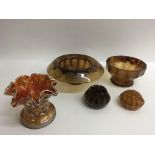 Two Art Deco brown cloud glass bowls and a Carniva