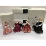 Four boxed Royal Doulton figures.