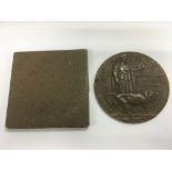 A WW1 death plaque in original wax cover for 33157