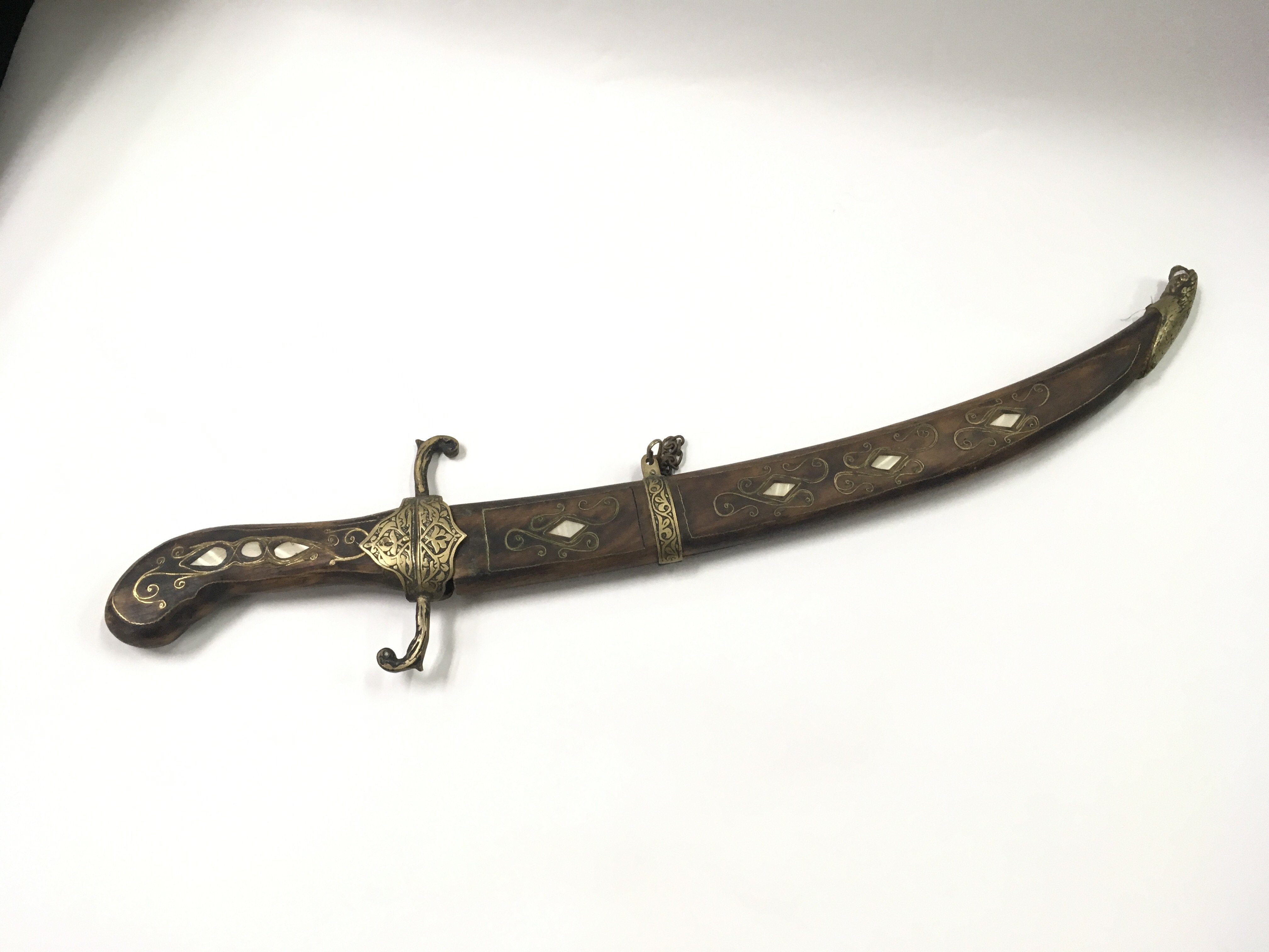 An old Turkish knife or small sword with wooden hi