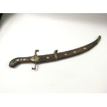 An old Turkish knife or small sword with wooden hi