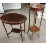 An oval occasional table and plant stand