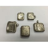 Five silver vesta cases.