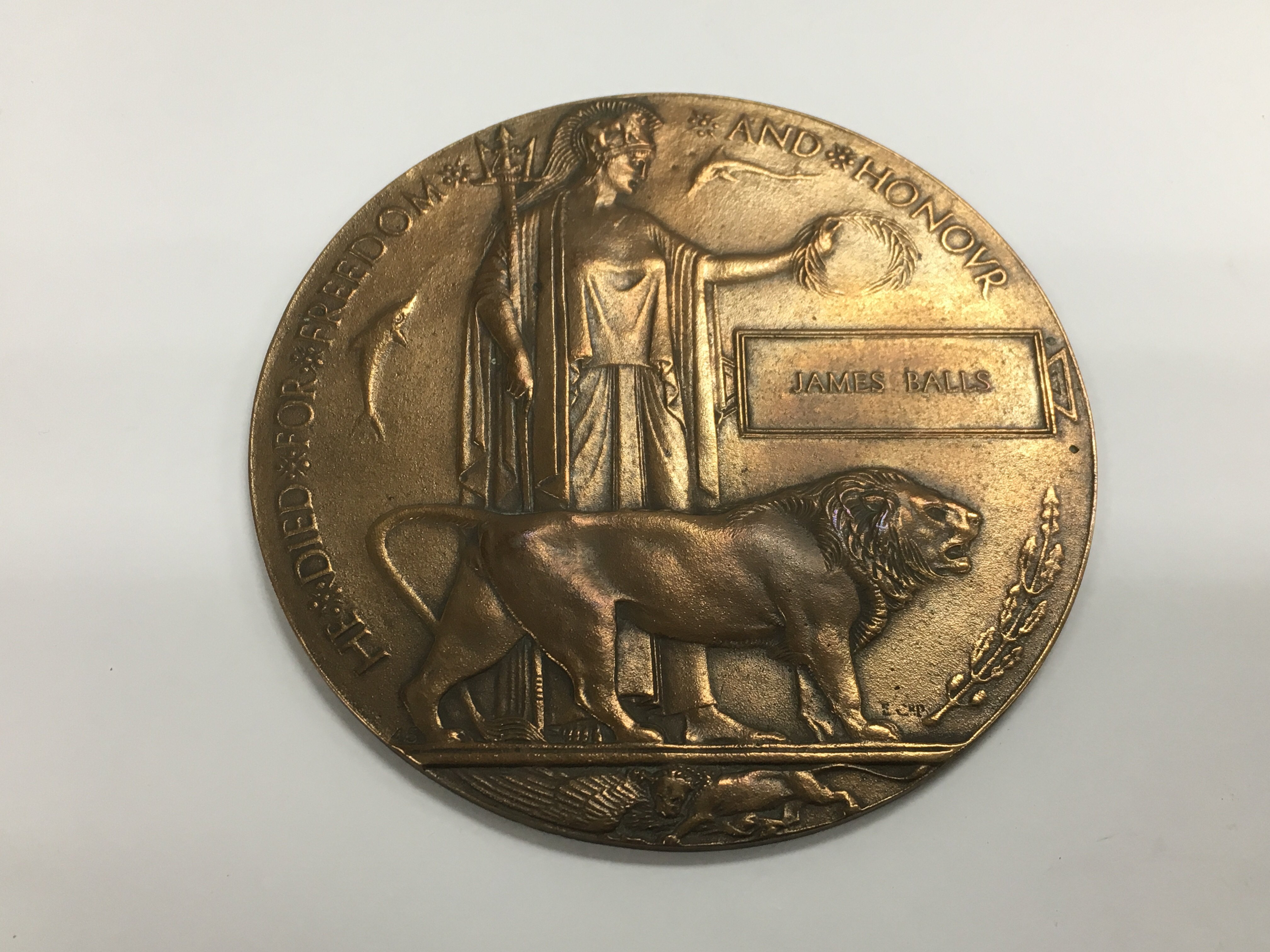 A WW1 death plaque with four possibilities as to w