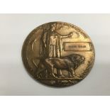 A WW1 death plaque with four possibilities as to w