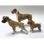 A Beswick dog and two others.