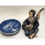 A Copenhagen porcelain figure of an oriental lady