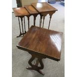 A nest of tall tables and an occasional table