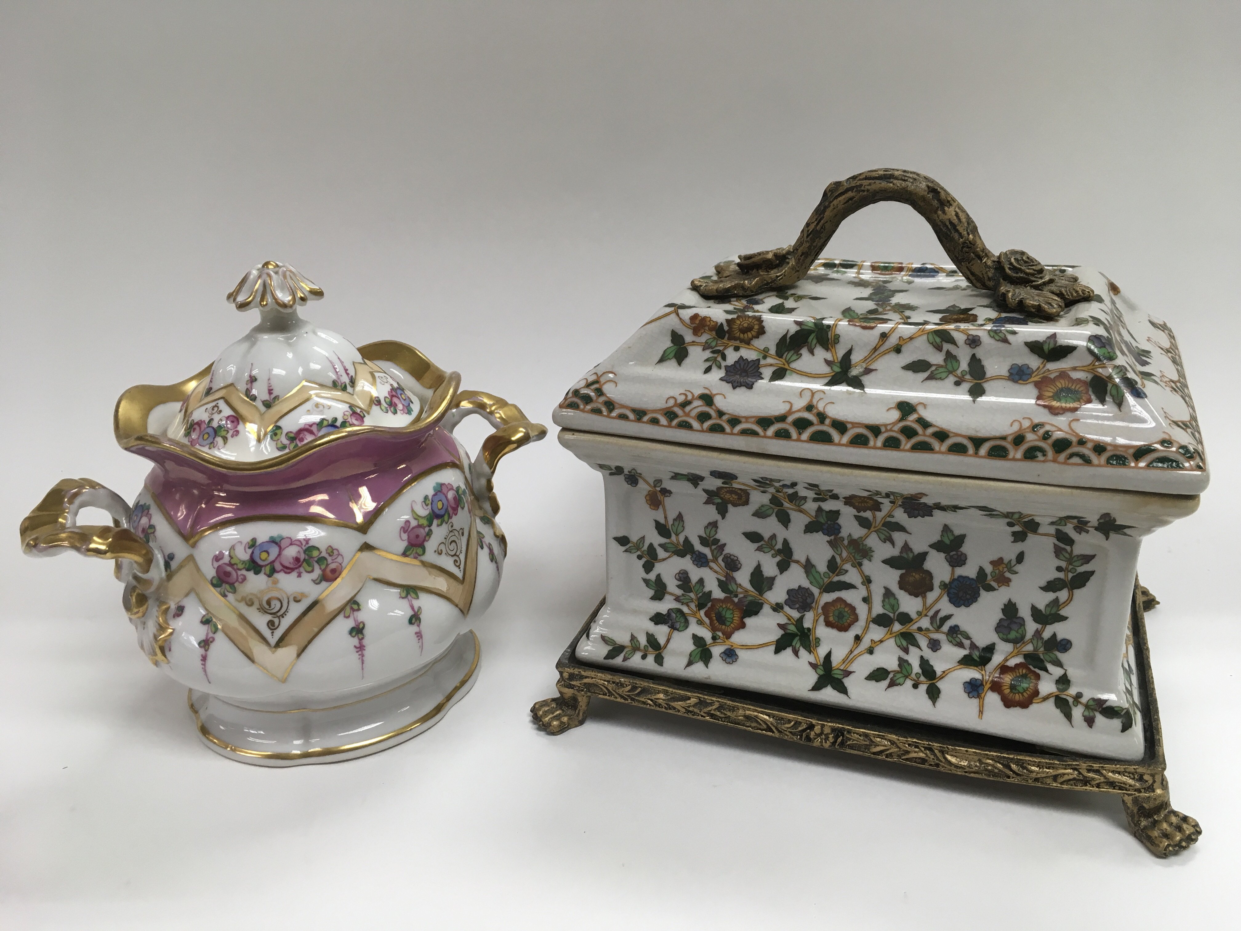 Two Continental porcelain jars and covers, one of