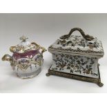 Two Continental porcelain jars and covers, one of