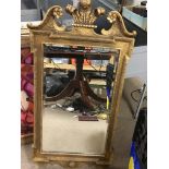 A Regancy Style gilt wall mirror with Prince of Wales Feathers.