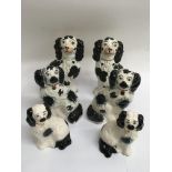 Three pairs of Staffordshire dogs