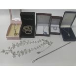 A collection of various silver jewellery including