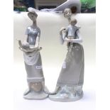 Two Lladro figures (one damaged).