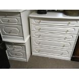 A modern white painted chest of drawers and two co