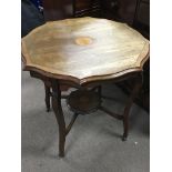 An Edwardian inlaid Mahogany Occasional table with
