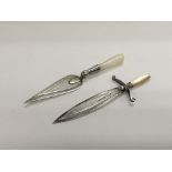 Two silver bookmarks with mother of pearl handles.