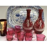 A collection of cranberry glass including two Mary