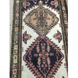 A Persian style runner with geometric pattern and