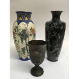 A Black cloisonné vase decorated with birds amongs