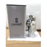 A boxed Lladro figure of a bride and groom