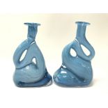 A pair of modern design art glass candlesticks in