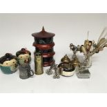 A collection of oddments comprising a bone and wood bangle hat pins laquer boxes a trench art