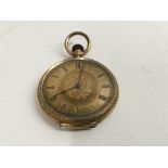 A 18 ct gold fob watch button wind with Roman nume
