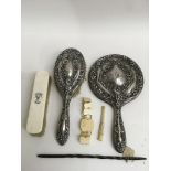 A silver mirror and brush set plus bone items