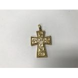 A 14ct hollow gold Celtic design cross. Weight app