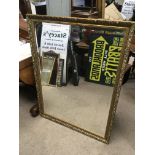 A modern gilt framed mirror, approx 94cm x 125cm.