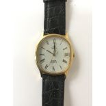 A Gents Omega De Ville gold tone quartz wristwatch