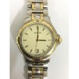 A gents Gucci bi metal quartz watch with date aper