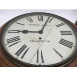 A oak cased wall clock Bonner and Sons Colchester