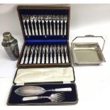 A wooden cased set of silver plated fish knives and forks with mother of pearl handles, plus a