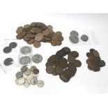 A small collection of coinage including pennies.