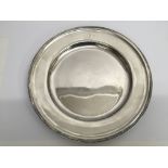 A Silver 19th Century plate possible Danish with engraved initials diameter 415g diameter 28cm.