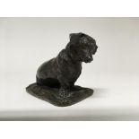 An Cecil brown bronze of a seated dachshund base signed