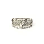 An 18ct white gold ring of unusual design, total weight approx 8.4 grams, ring size O.