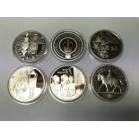 A cased set, in fitted box, of 24 silver silver coins in commemoration of Queen Elizabeth II