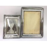 Two Sheffield silver photo frames hallmarked HW (possibly for Henry Wilkinson & Co). One dated