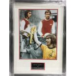 Three framed and glazed photographs of Arsenal FC players comprising Charlie George, Ray Kennedy and