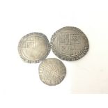 A James I Shilling A 1587 Silver 6d Coin and a 17th Century Commonwealth half Groat. (3)