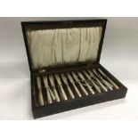 A cased Mappin & Webb silver plated fish knives and forks set.