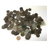 A large collection of used, circulated Victorian pennies and other coins.