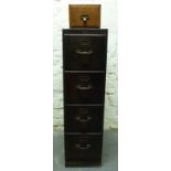 A vintage oak four drawer filing cabinet and a further small single drawer,