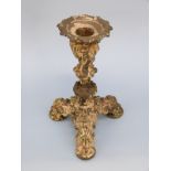 A 19thC ornate bronze / brass candlestick,