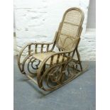 A bentwood rocking chair with rattan seat and a hatstand,