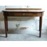 A mahogany hall table with single drawer raised on square tapering legs,